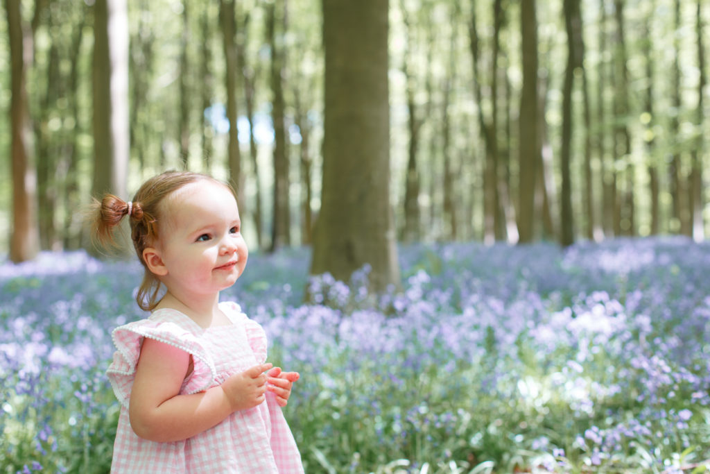 Little girl in bluebell woods | Ewa Jones Photography