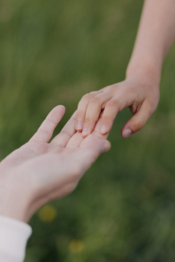 close up of holding hands. Maternity photo session. Hampshire photographer. Ewa Jones Photography