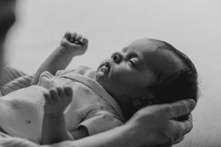 black and white image of a newborn baby. Newborn photo session at home. Hampshire photographer. Ewa Jones Photography